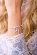 Pulseiras c/ 3 berloques Cristo